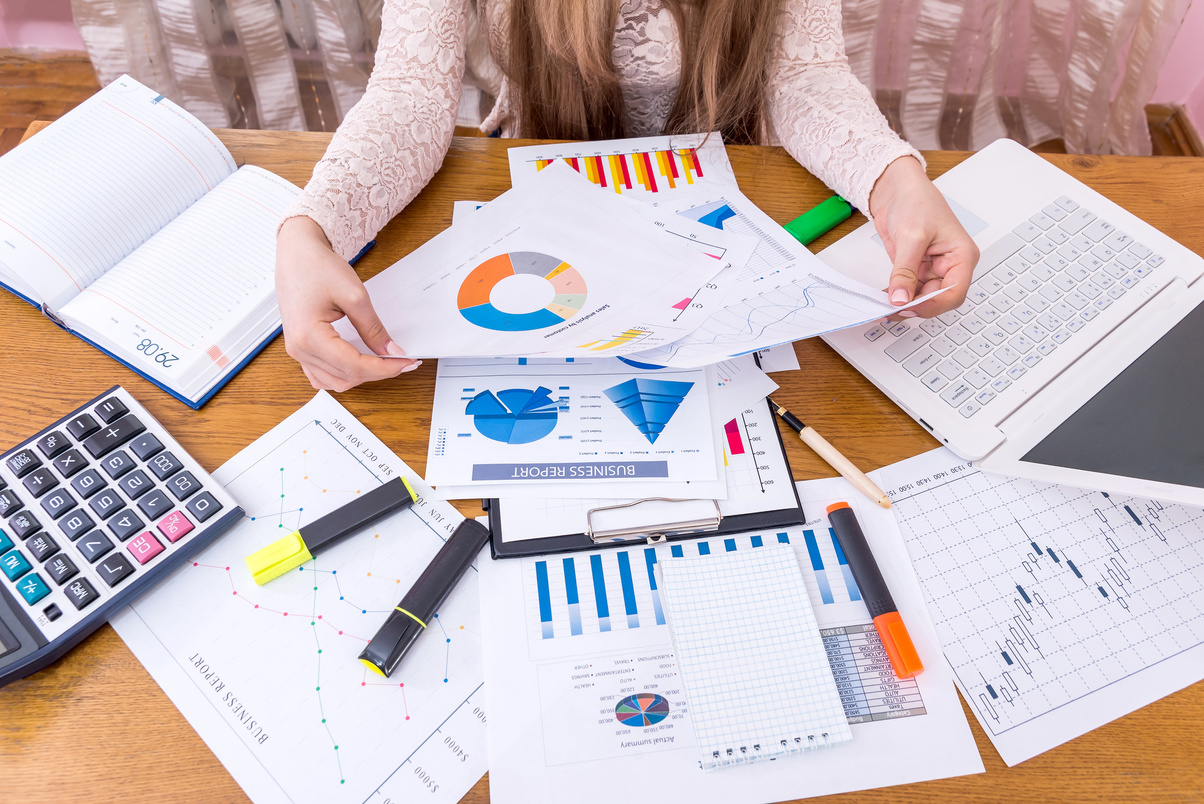 Financial Analyst Comparing Business Graphs, Workplace, Office